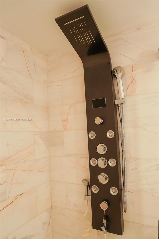 500 Three Islands Blvd Unit 106, Hallandale Beach, FL 33009 - bathroom view of tiled shower and arched walkways