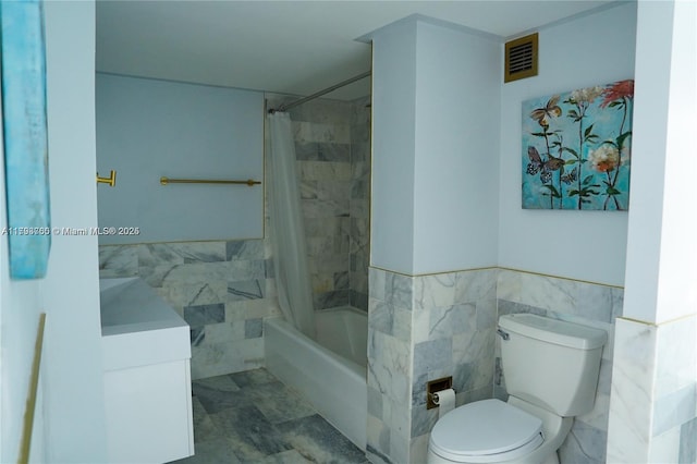 500 Three Islands Blvd Unit 106, Hallandale Beach, FL 33009 - bathroom with tile walls, shower / bath combination with curtain, toilet, wainscoting, and vanity