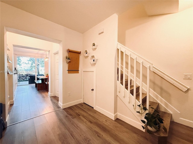 12154 SW 27th St Unit 1102, Miramar, FL 33025 - stairs with wood finished floors and baseboards