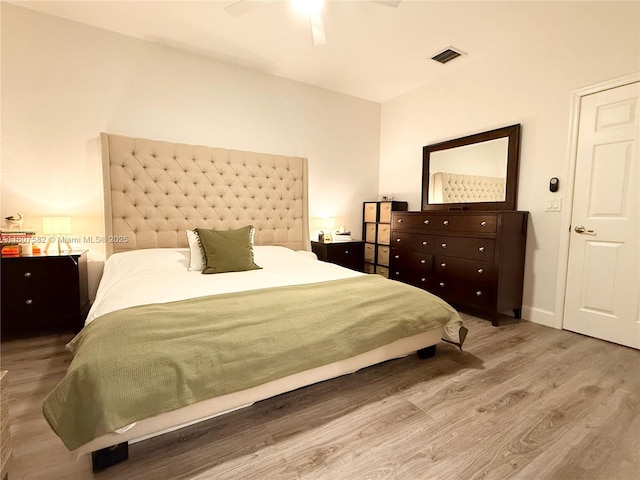 12154 SW 27th St Unit 1102, Miramar, FL 33025 - bedroom with wood finished floors and a ceiling fan