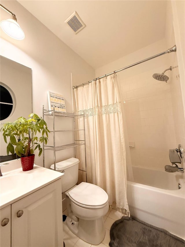 12154 SW 27th St Unit 1102, Miramar, FL 33025 - bathroom with tile patterned floors, toilet, vanity, and shower / tub combo