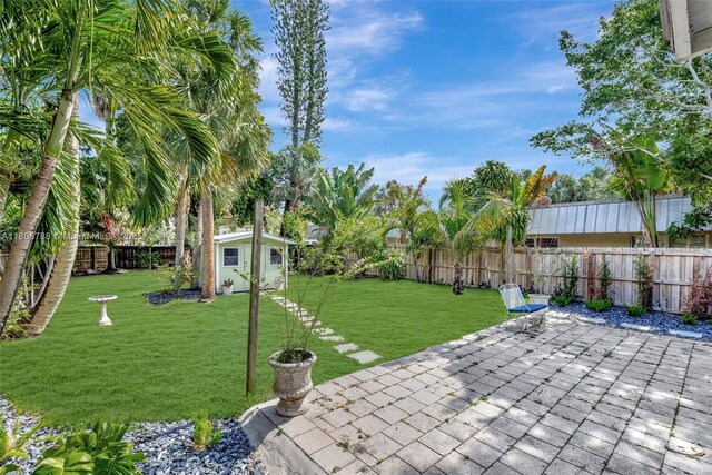 1031 SW 4th St, Fort Lauderdale, FL 33312 - view of yard with a patio