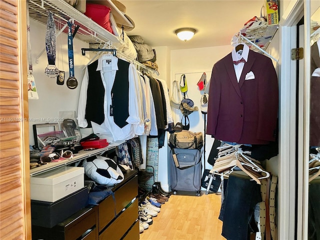 2750 NE 183rd St Unit 2308, Aventura, FL 33160 - walk in closet featuring wood finished floors