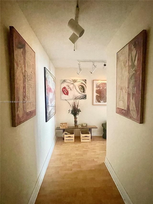 2750 NE 183rd St Unit 2308, Aventura, FL 33160 - hall featuring track lighting and baseboards