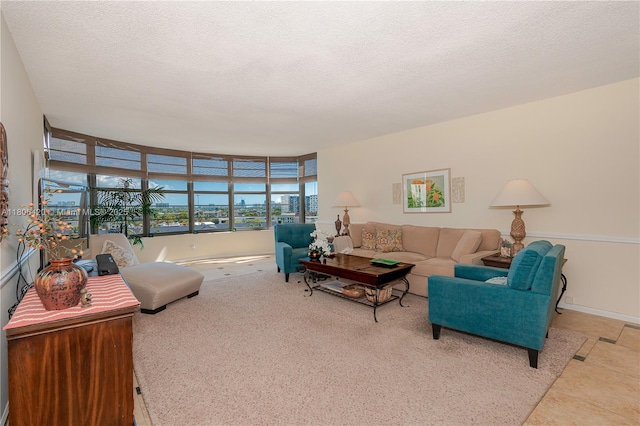 3051 NE 48th St Unit 604, Fort Lauderdale, FL 33308 - living room featuring a textured ceiling