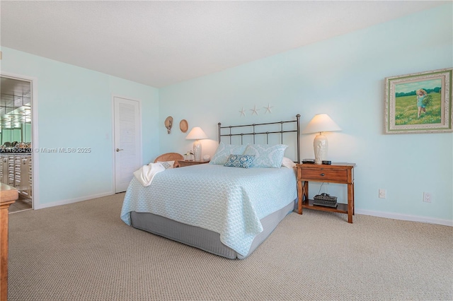 3051 NE 48th St Unit 604, Fort Lauderdale, FL 33308 - bedroom featuring carpet, baseboards, and a closet
