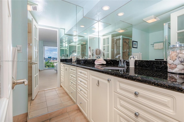 3051 NE 48th St Unit 604, Fort Lauderdale, FL 33308 - bathroom with a stall shower, tile patterned floors, vanity, and recessed lighting