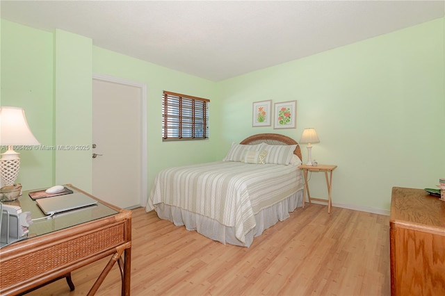 3051 NE 48th St Unit 604, Fort Lauderdale, FL 33308 - bedroom with light wood-type flooring and baseboards