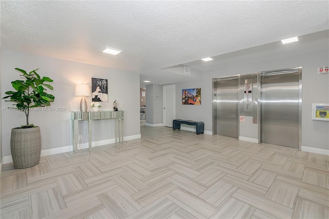3051 NE 48th St Unit 604, Fort Lauderdale, FL 33308 - building lobby with a textured ceiling