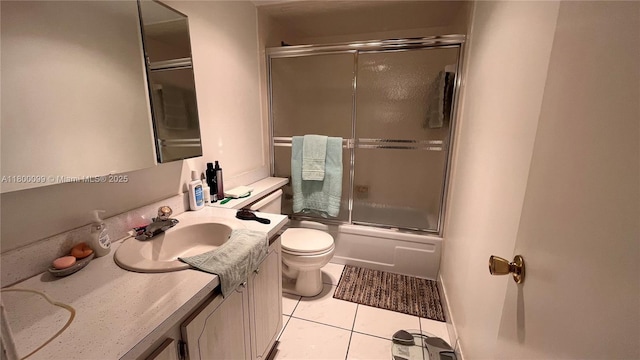 610 NE 12th Ave Unit 102, Hallandale Beach, FL 33009 - bathroom with vanity, tile patterned flooring, and enclosed tub / shower combo
