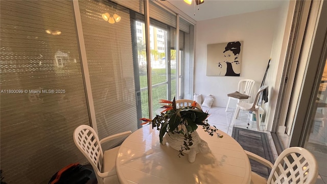 610 NE 12th Ave Unit 102, Hallandale Beach, FL 33009 - dining room featuring plenty of natural light
