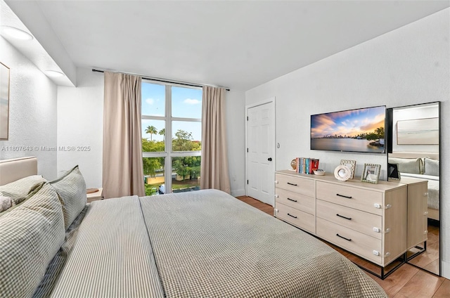 2055 SW 122nd Ave Unit 524, Miami, FL 33175 - bedroom with light wood-type flooring