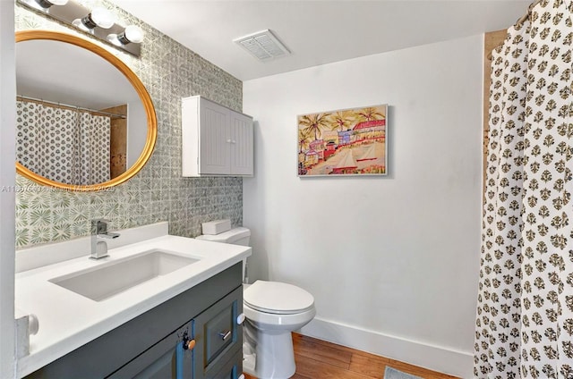 2055 SW 122nd Ave Unit 524, Miami, FL 33175 - full bath with wood finished floors, vanity, baseboards, toilet, and a shower with shower curtain
