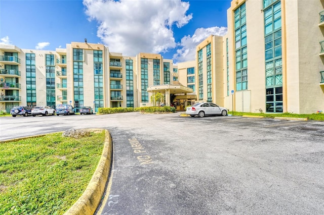 2055 SW 122nd Ave Unit 524, Miami, FL 33175 - view of building exterior with uncovered parking