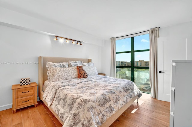 2075 SW 122nd Ave Unit 517, Miami, FL 33175 - bedroom with light wood-type flooring