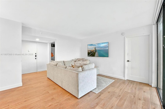 2075 SW 122nd Ave Unit 517, Miami, FL 33175 - living room featuring light wood-type flooring and baseboards