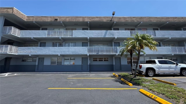 11195 SW 1st St Unit 319, Sweetwater, FL 33174 - view of apartment building / complex featuring uncovered parking