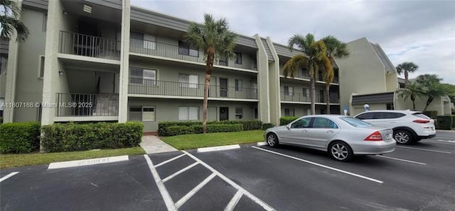 4090 Tivoli Ct Unit 201, Lake Worth, FL 33467 - view of apartment building / complex featuring uncovered parking