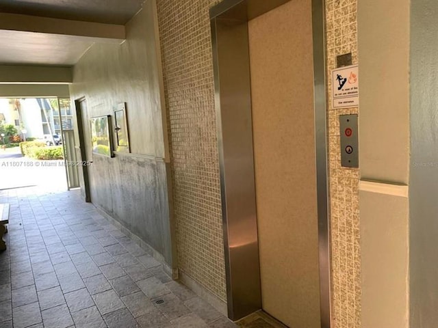 4090 Tivoli Ct Unit 201, Lake Worth, FL 33467 - hall with elevator