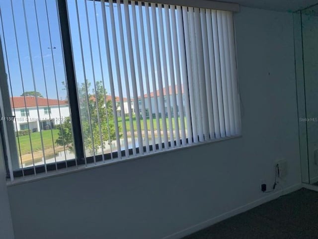 4090 Tivoli Ct Unit 201, Lake Worth, FL 33467 - spare room featuring baseboards