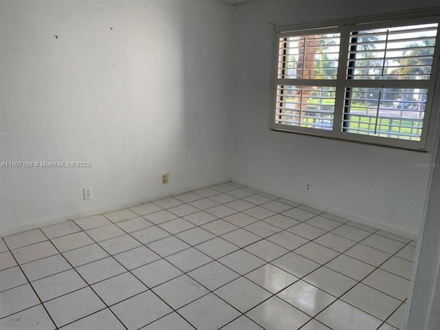 4090 Tivoli Ct Unit 201, Lake Worth, FL 33467 - unfurnished room with light tile patterned floors
