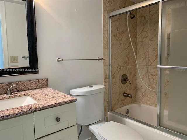 4090 Tivoli Ct Unit 201, Lake Worth, FL 33467 - full bathroom with toilet, enclosed tub / shower combo, and vanity