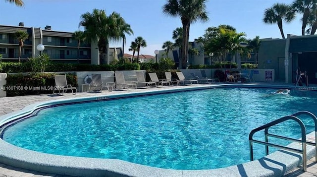4090 Tivoli Ct Unit 201, Lake Worth, FL 33467 - community pool with a patio