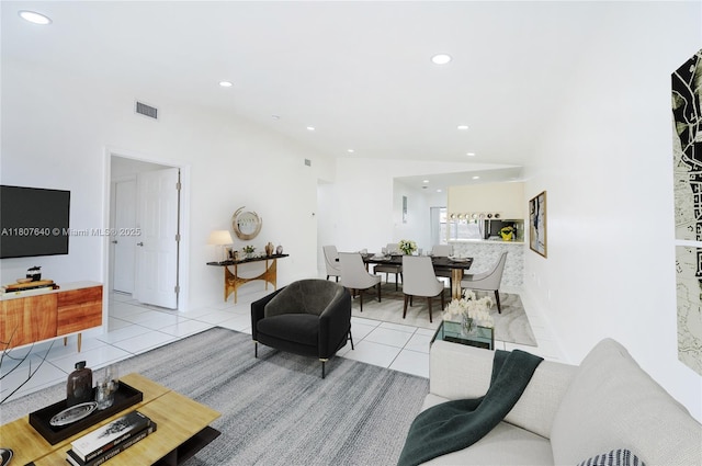 9021 NW 121st Ter Unit 85, Hialeah Gardens, FL 33018 - living area with light tile patterned floors and recessed lighting