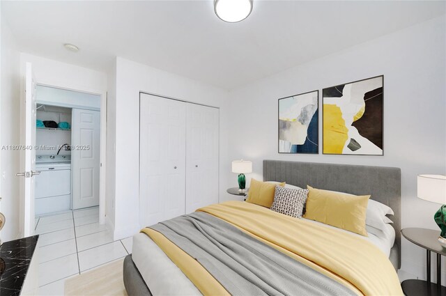 9021 NW 121st Ter Unit 85, Hialeah Gardens, FL 33018 - bedroom with washer / clothes dryer, tile patterned floors, and a closet