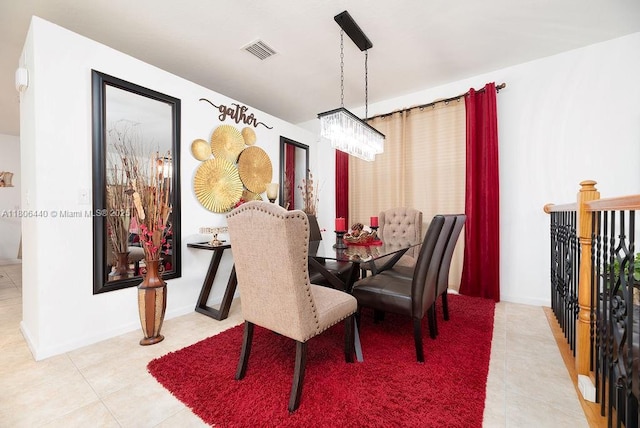 4832 SW 159th Ave, Miramar, FL 33027 - dining area with light tile patterned floors, a chandelier, and baseboards