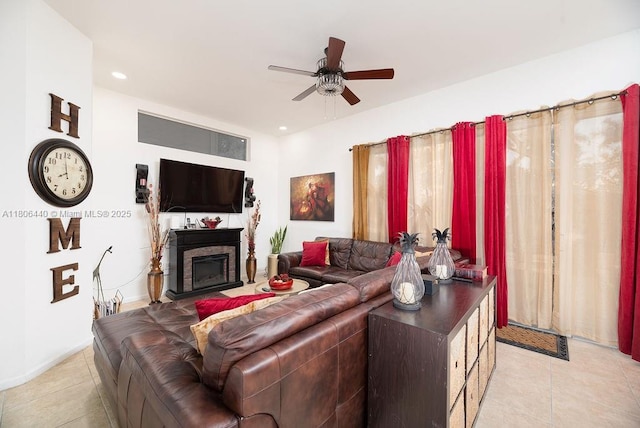 4832 SW 159th Ave, Miramar, FL 33027 - living area featuring light tile patterned flooring, ceiling fan, recessed lighting, a fireplace, and baseboards