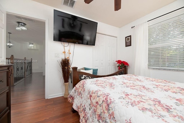 4832 SW 159th Ave, Miramar, FL 33027 - bedroom with dark wood-style flooring, baseboards, a closet, and ceiling fan