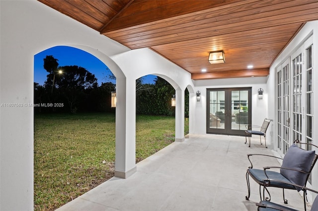321 SW 1st Ave, Boynton Beach, FL 33435 - view of patio featuring french doors