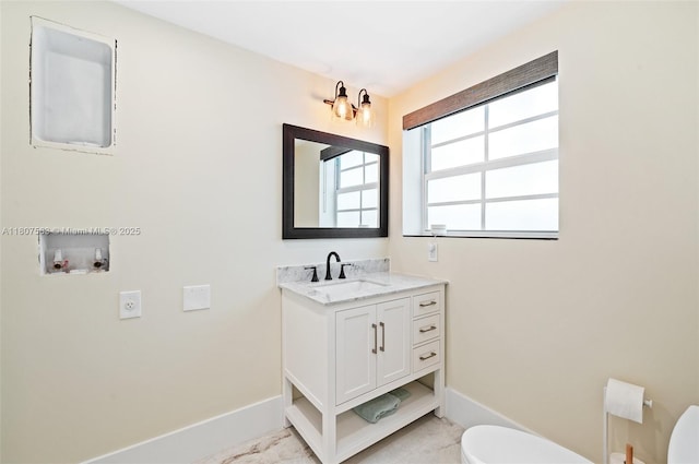 321 SW 1st Ave, Boynton Beach, FL 33435 - half bathroom featuring toilet and vanity