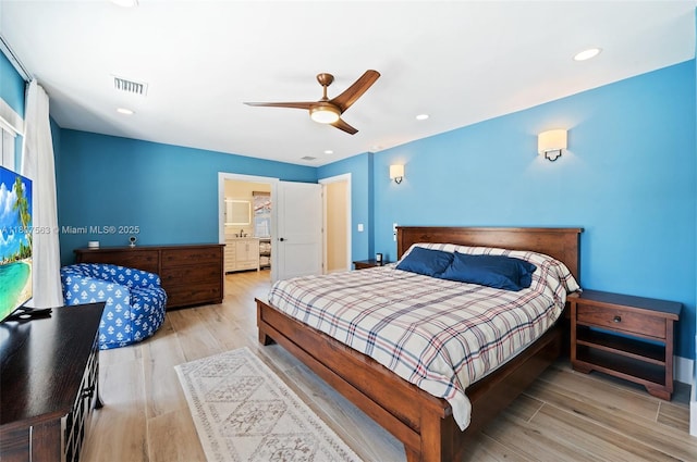 321 SW 1st Ave, Boynton Beach, FL 33435 - bedroom with wood finished floors, ceiling fan, and recessed lighting