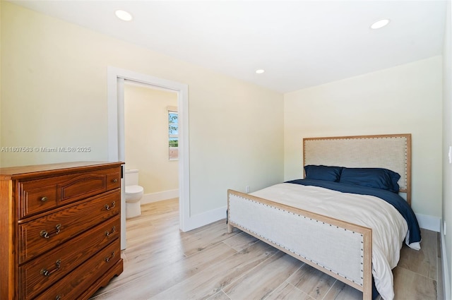 321 SW 1st Ave, Boynton Beach, FL 33435 - bedroom with light wood-type flooring and recessed lighting