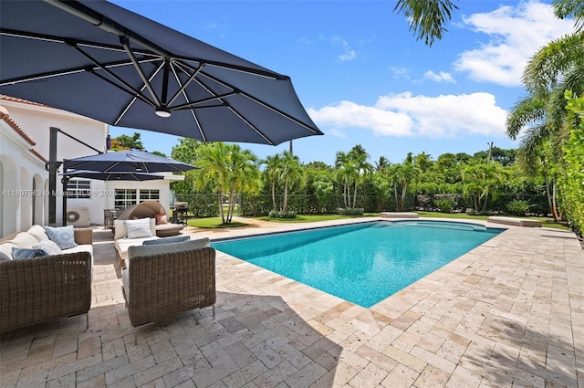 321 SW 1st Ave, Boynton Beach, FL 33435 - swimming pool with a patio and an outdoor living space