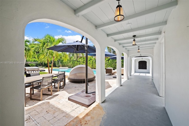 321 SW 1st Ave, Boynton Beach, FL 33435 - view of patio / terrace featuring an outdoor pool, a grill, and outdoor dining area