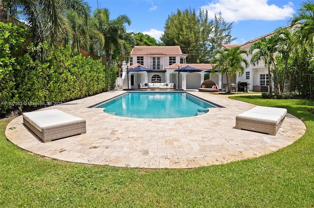 321 SW 1st Ave, Boynton Beach, FL 33435 - swimming pool featuring an exterior structure, an outdoor structure, a patio area, a yard, and french doors