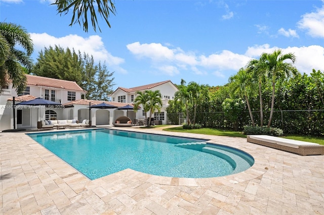321 SW 1st Ave, Boynton Beach, FL 33435 - view of pool featuring a patio area and an outdoor living space