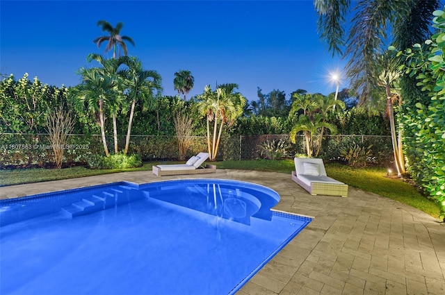 321 SW 1st Ave, Boynton Beach, FL 33435 - view of swimming pool featuring a fenced backyard and a patio area