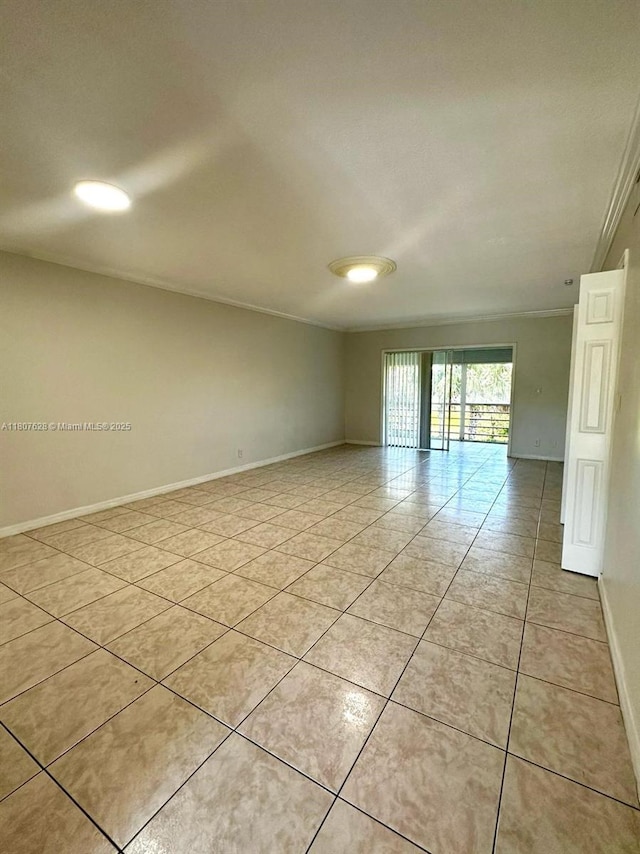 4291 NW 9th Ave Unit 202, Deerfield Beach, FL 33064 - empty room with light tile patterned flooring and baseboards