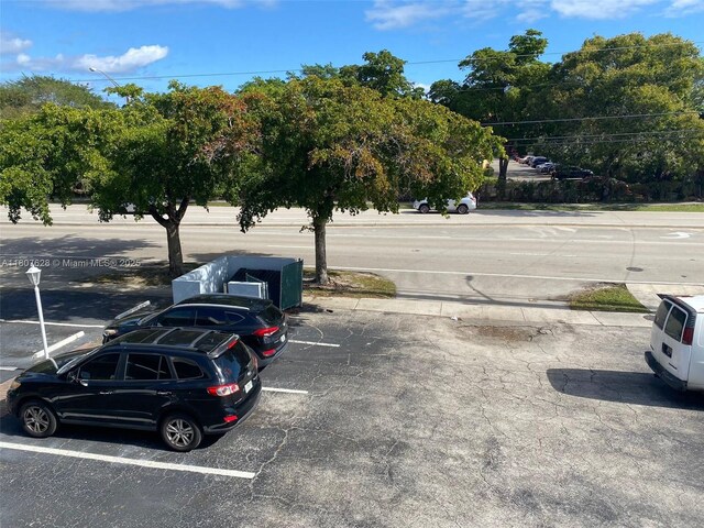 4291 NW 9th Ave Unit 202, Deerfield Beach, FL 33064 - view of uncovered parking lot