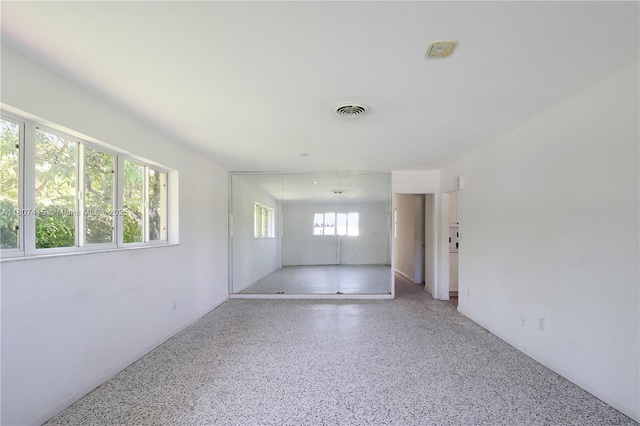 17535 SW 91st Ave, Palmetto Bay, FL 33157 - spare room featuring speckled floor