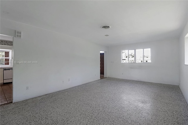 17535 SW 91st Ave, Palmetto Bay, FL 33157 - empty room featuring speckle patterned floor