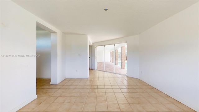 17535 SW 91st Ave, Palmetto Bay, FL 33157 - unfurnished room featuring baseboards and fire sprinkler in ceiling