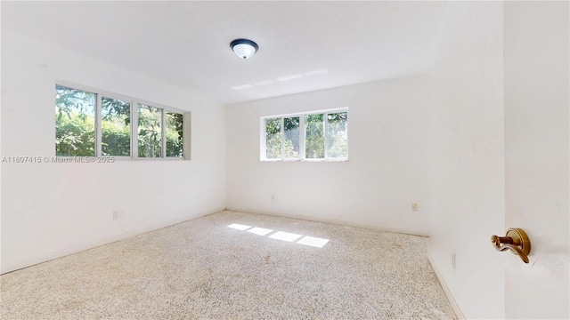 17535 SW 91st Ave, Palmetto Bay, FL 33157 - unfurnished room featuring speckle patterned floor and baseboards