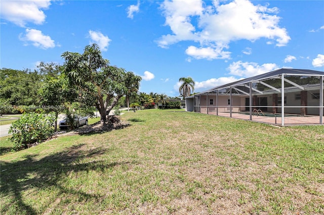 17535 SW 91st Ave, Palmetto Bay, FL 33157 - view of green lawn featuring a lanai and a patio