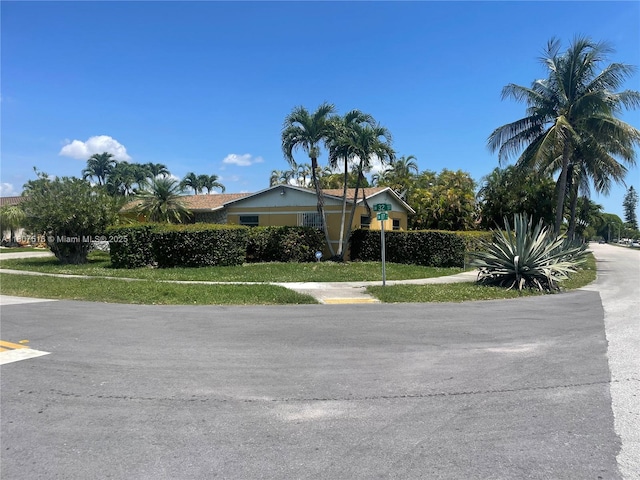 11753 SW 32nd St, Miami, FL 33175 - view of front of property with a front yard
