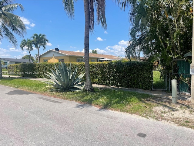 11753 SW 32nd St, Miami, FL 33175 - view of front of home with a gate